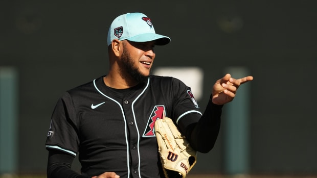 Arizona Diamondbacks left-hander Eduardo Rodriguez (57) warms up as part of workouts at Salt River Fields.